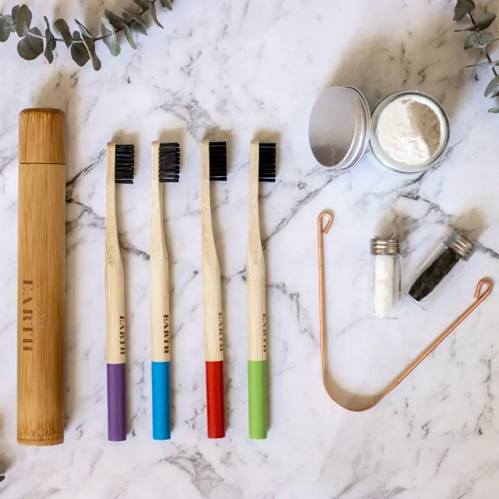 Eco friendly Oral and hygiene Kit - bamboo toothbrush stand, a bamboo toothbrush case for travelling, Eco friendly dental floss, a copper tongue scraper and a 100% Organic Bamboo Powder toothpaste