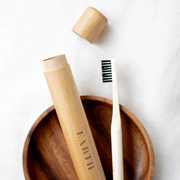 Bamboo toothbrush stand and a bamboo toothbrush case for travelling. | us and the earth