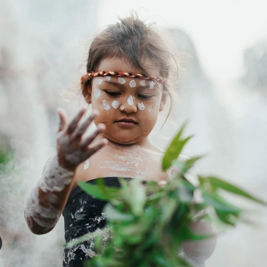A child, her face reflecting distress, conveys a plea to preserve the rainforest | us and the earth