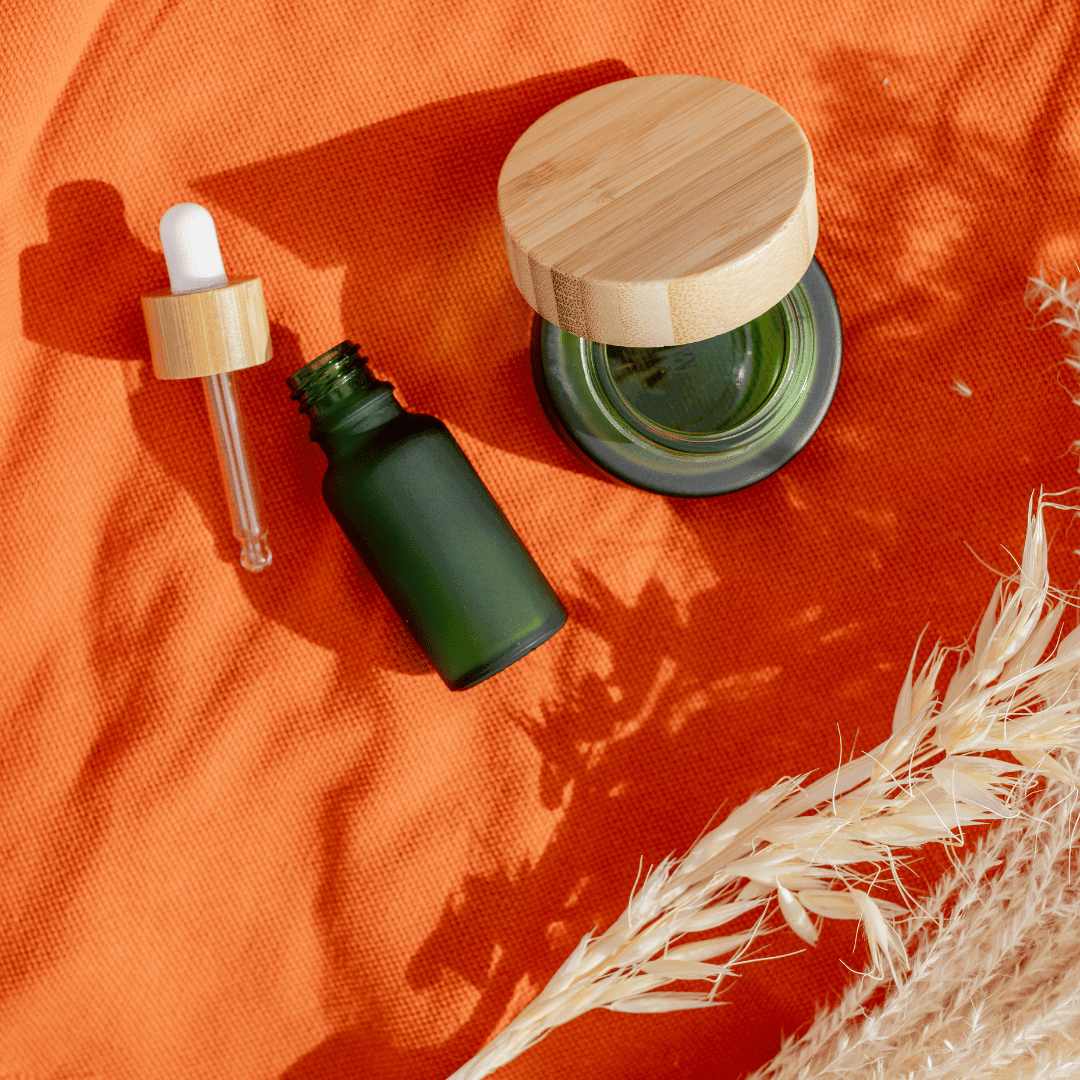 Frosted Green  Cosmetic Jar and Dropper bottle flat lay image